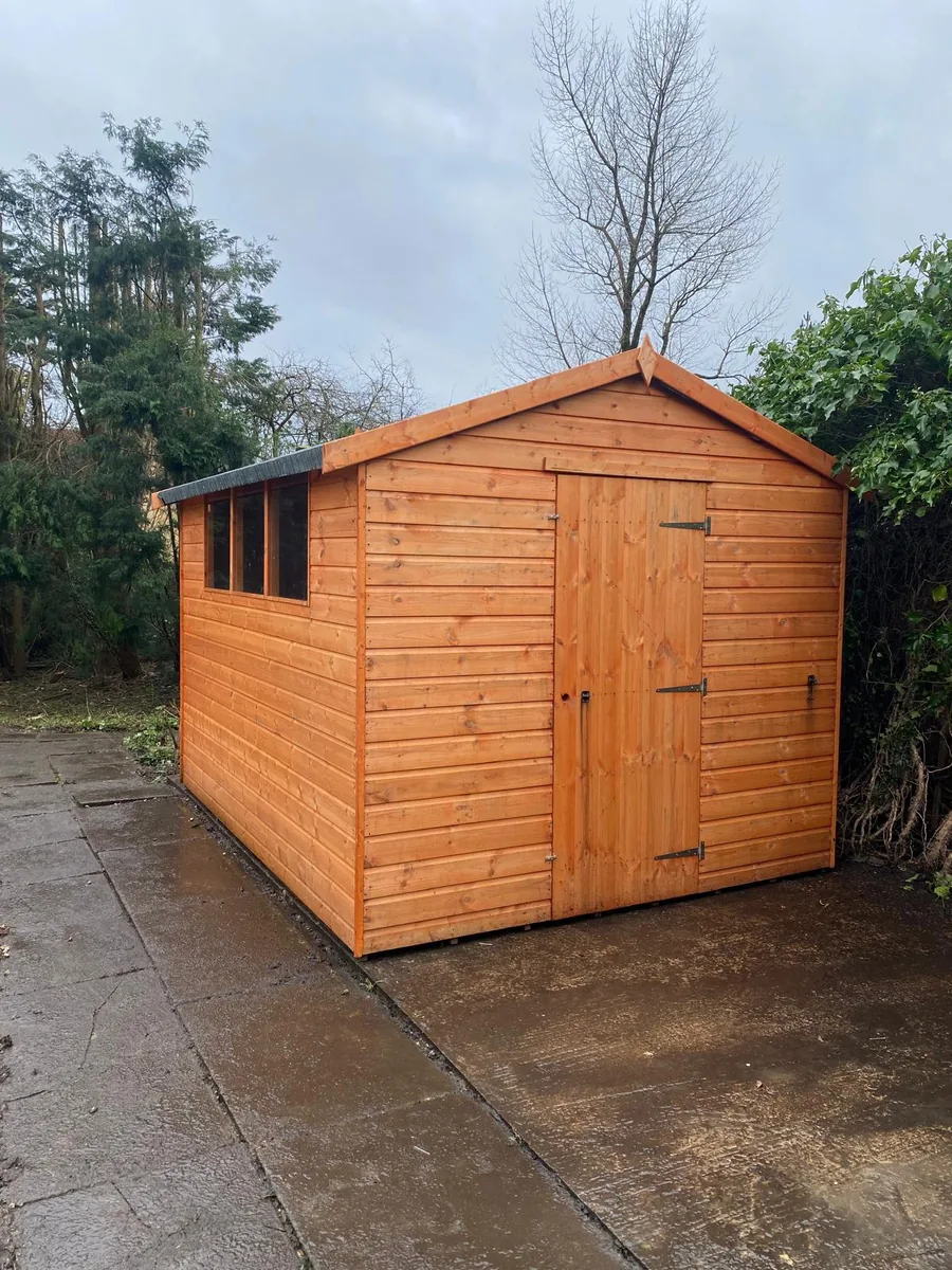 New timber shed installed on a cleared garden base